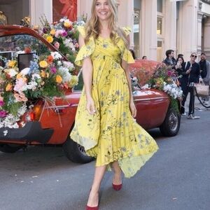 Self portrait yellow summer dress with ruffle sleeves. Size 2 worn once